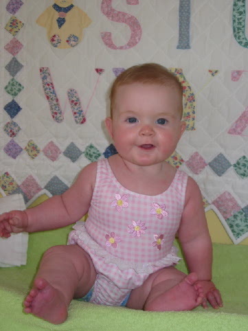 Jane in her swimsuit ready for her first lesson at the YMCA
